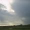 Sun Poking Through the Storm Clouds - Fast Changing Albertan Weather Near Innisfail, North of Calgary