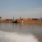 Cargo barges on the Mackenzie River bringing cargo to Norman Wells.