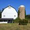 White barn w/ silos