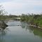 Stone Bridge Remains in Elk River, Fayetteville, TN. Was 450 feet long completed 1861, collapsed 1969. Six Arches, Constructed without keystones of dry laid Limestone