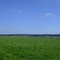 Landschaft mit Windrad
