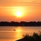 fishing boat at sunset on Eagle Lake Fla (5-2008)