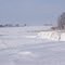 snowdrifts on hay roundbales