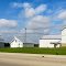 Roadside white barns