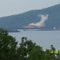 Quarry Explosion across Fairfax Harbour, Rock Rubble for Road Base work around POM,  CB Motukea Island on right, Port Moresby, PNG