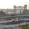 Early Morning Tugboat Going Under Bridge