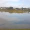 Reflection of the sky & clouds on Grove Pointe lake