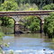 Stone arch road bridge over Kraai river