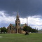 Church in Kroonstad. Old fashioned drilling machine infront, drilling for borehole water.