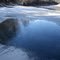 Ice in a puddle at noon, a rare event