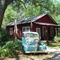 little red schoolhouse with truck, Micanopy, Florida (3-2006)