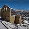ANGOUSTRINE [66] - Eglise romane au premier plan et la nouvelle en contre-bas vues depuis le cimetière. (mars 2008)