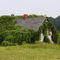 Suffocated (   . . .   Nearly eaten up by Kudzu, a hardy perennial which can spread up to 60 feet a year.  Since the 1950's the vine has swallowed 150,000 acres a year - eight million U.S. acres total.  )