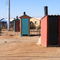 Otji-Toiletten und Lehmhäuser in Otjiwarongo
