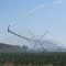    A  giant "dragon" spewing out artificial rain over rural crop of Vidalia sweet onions