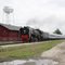 1130 TRAIN GOING PAST THE STUART DEPOT.JPG