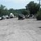 Road vanishes into garbage pile.