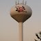 Rose City water tower at sunset