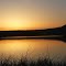 Sunrise on pond< Bruneau Sand Dunes