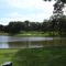 Second Hole par 3 over the water with the Gun Club in the back