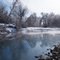 Frosty cottonwood trees reflected in the East Gallatin River
