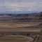 Beartooth Mountains, winter wheat fields and Rimrocks as seen from Phipps Park outside Billings
