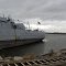 USS Edson takes on a list during low water levels