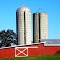 Farm Holding on  two Silos---st