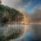 Foggy sunrise on the lake
