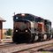 Three Burlington Northern Santa Fe Railway Diesel Locomotives head Westbound at Beach, ND