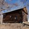 the old 1820's log-frame Sandy Creek Baptist Meeting House nestled in a grove of sourwood trees on a hill, its modest appearance belying its significance in American religious history, 1-13-11