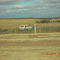 Rusted out car on the Texas prarie