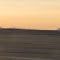 Serene Summmits Far Beyond Golden Prairie At Sunset Near Great Falls Montana Jan '13