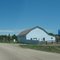 Blue barn across from the roadside park