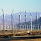 NEVADA - Ginormous Wind Turbines generate power.. Desert back road to California