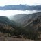 Rampart Range Road, above the clouds with Pikes Peak in upper right