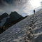 Crossing a snowfield on a climb of Three Fingers