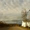 house on bright cloudy day