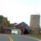 old barn old mobie home on curve