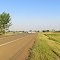 Entering the eastern city limits of Baker, Montana, alongside U.S. Hwy. 12, looking westerly