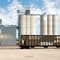 Grain Elevator and Burlington Northern Santa Fe Railway 3-Bay Covered Hopper No. 460695 at Cut Bank, MT