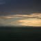 Distant Rockies Sunset from Amtrak Empire Builder - near Cut Bank, Montana