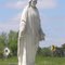 Christ statue on tombstone, near Lake Panorama, IA