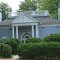 Hollywood Howard Hughes style dream house with large Boxwoods along North Main Street, Greeneville, TN