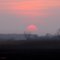 The Sun Is Setting Like A Red Rubber Ball