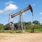 Old working oil pump next to the 287 near Bowie Texas.