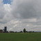It won't be long before this tranquil farm land is raped by "development"; bulldozed and covered with ugly plastic houses, strip malls, and asphalt. Every inch of it will be designated and landscaped for the sole purpose of filling the pocketbooks of a few men. But once it was beautiful.