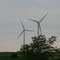 Giant wind turbines in Iowa , along the I-80 corridor.