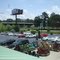 parking lot at DeWayne's Home and Garden Showplace, with U.S. Highway 70 Bypass crossing Interstate 95 beyond, 6-4-09