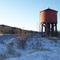 Union Pacific: Modern Diesel passes historic Steam Era Water Tank